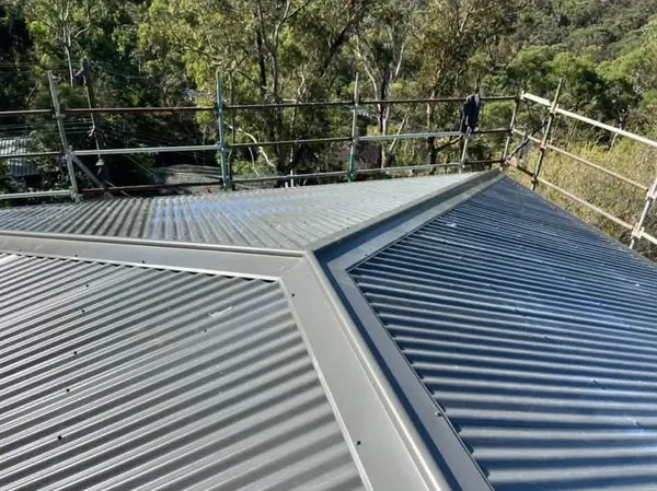 Metal roof extension under construction with scaffolding in Hornsby